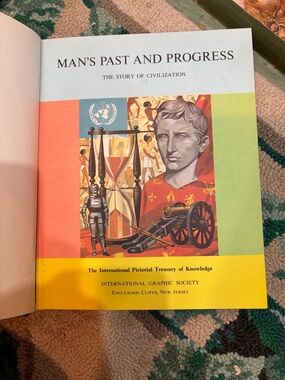 Man's Past and Progress Illustrated Hardcover - Colorful Pictorial Cover